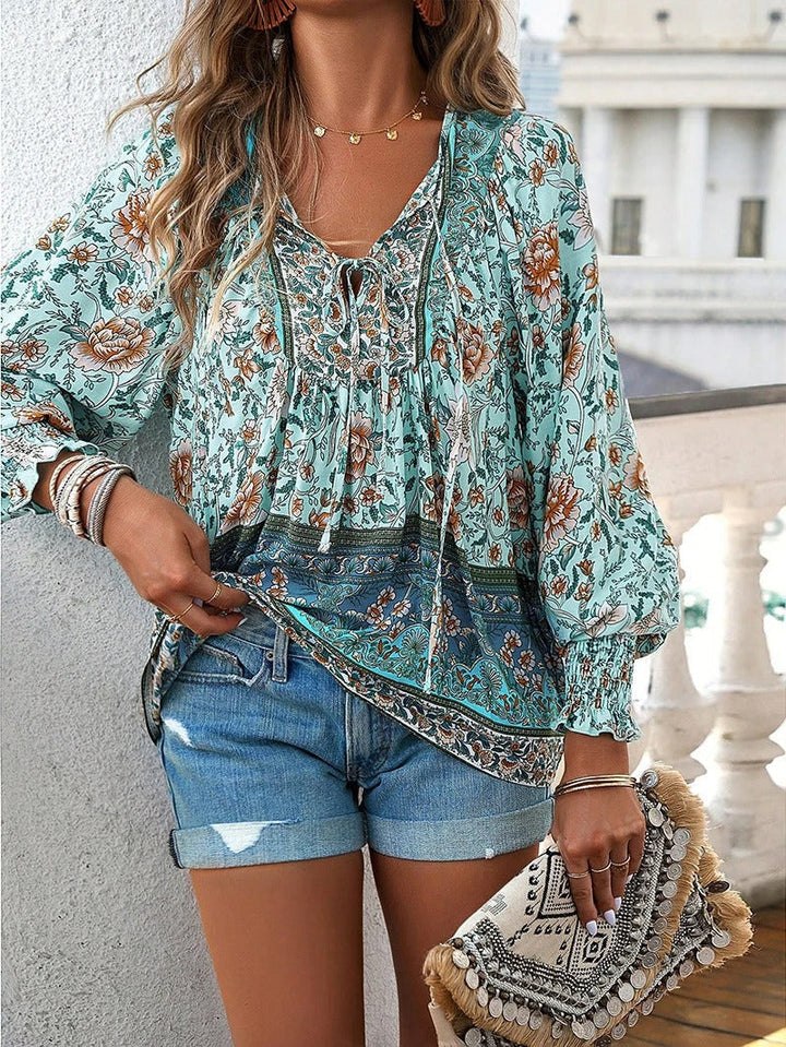 Damenbluse mit Blumenmuster und langen Puffärmeln