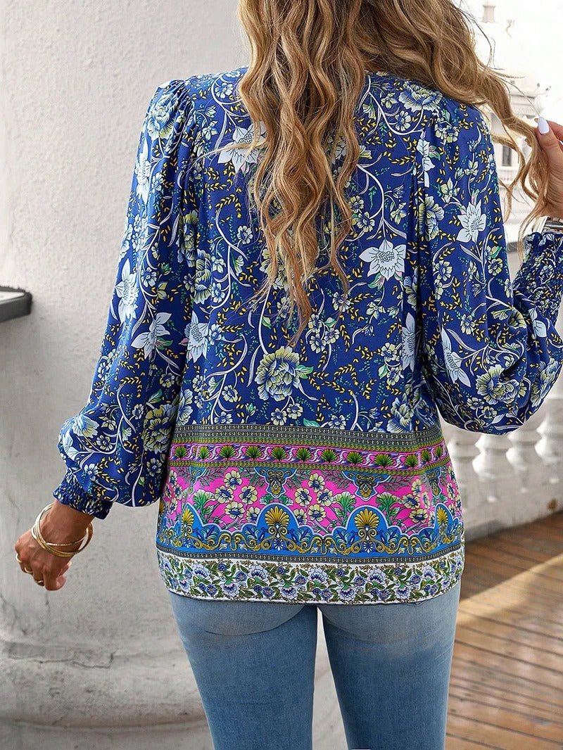 Damenbluse mit Blumenmuster und langen Puffärmeln