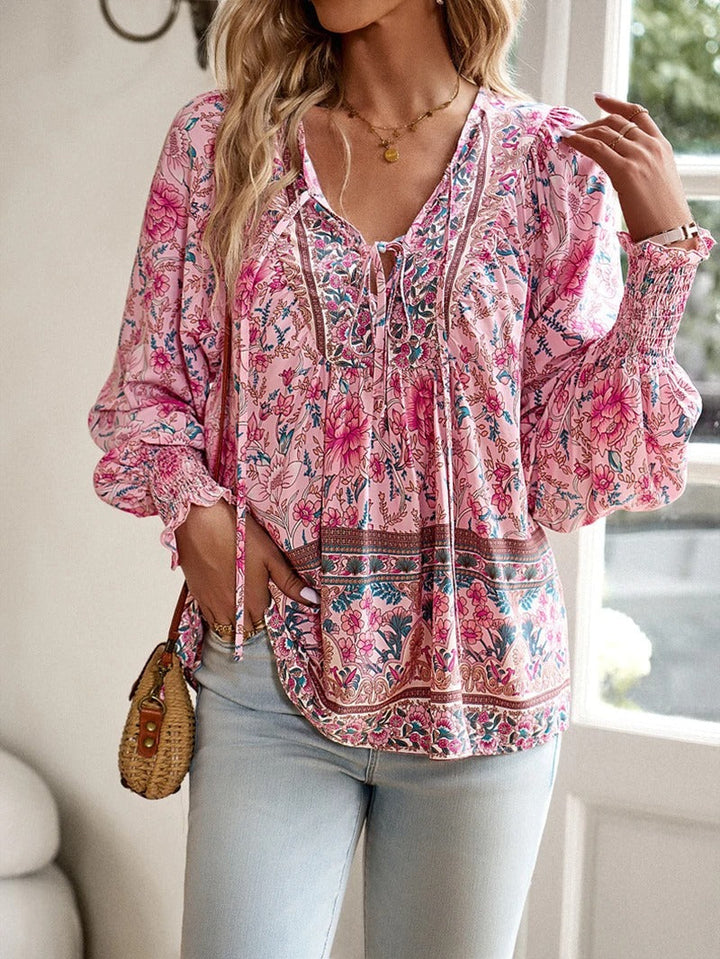 Damenbluse mit Blumenmuster und langen Puffärmeln