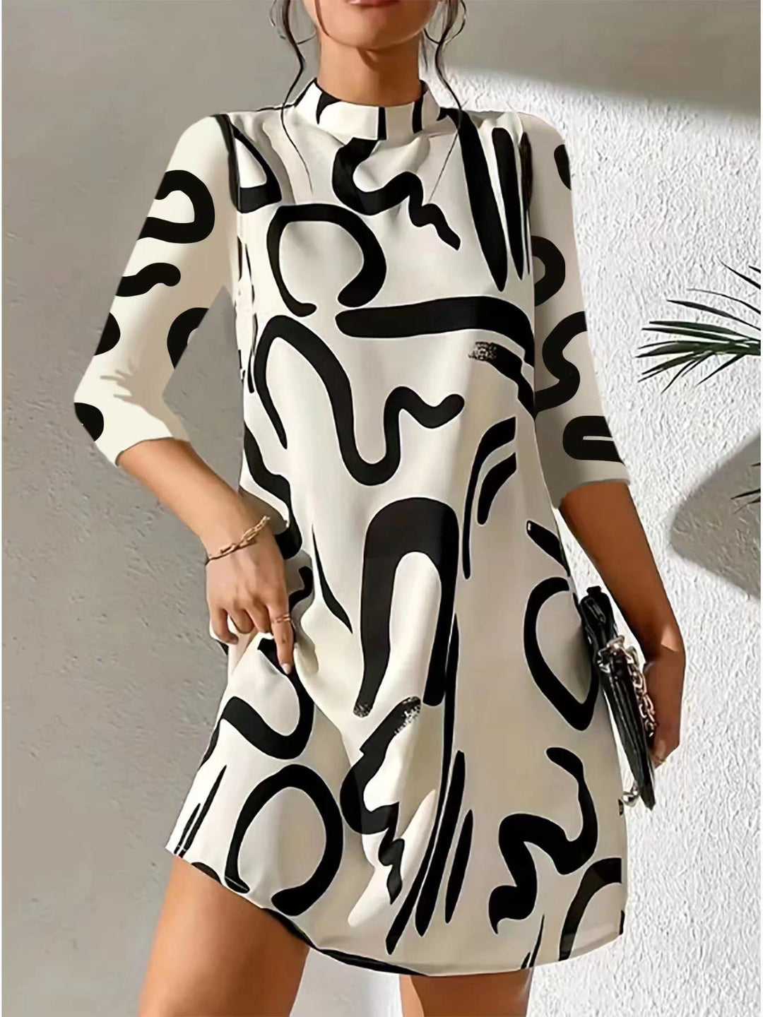 Damenkleid mit abstraktem Muster und Stehkragen