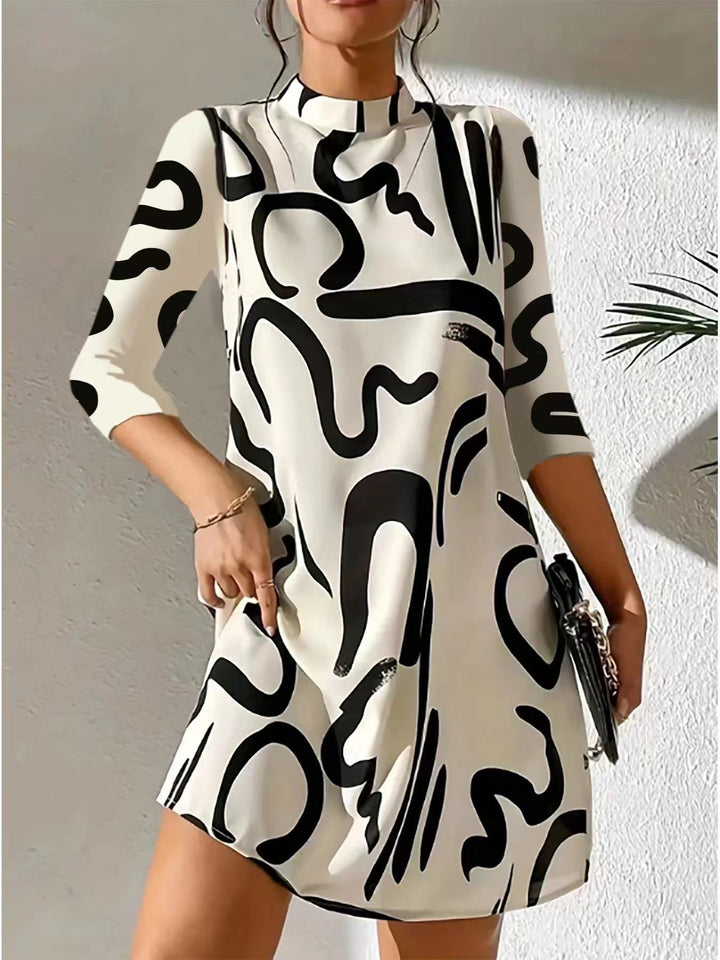 Damenkleid mit abstraktem Muster und Stehkragen
