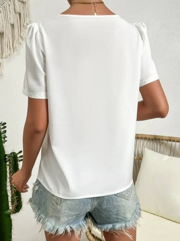 Damen Bluse mit kurzen Puffärmeln und asymmetrischem V-Ausschnitt