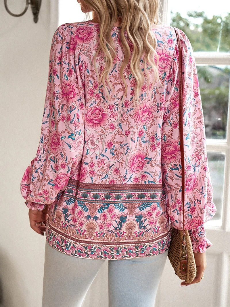 Damenbluse mit Blumenmuster und langen Puffärmeln