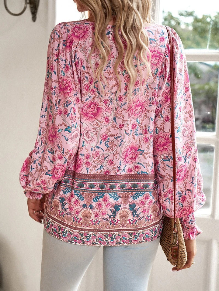 Damenbluse mit Blumenmuster und langen Puffärmeln